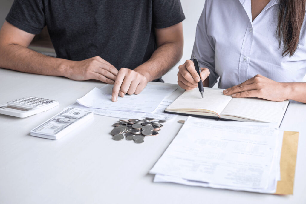 First-Time Homebuyer Mistakes couple budgeting