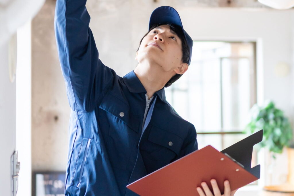 inspector checking a house