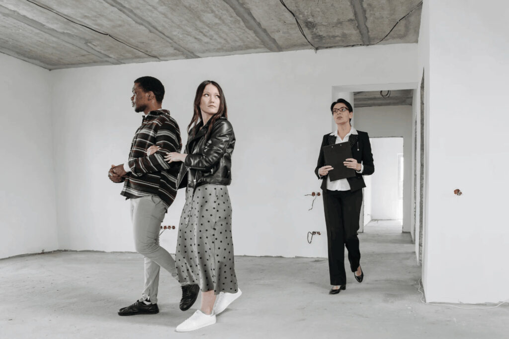 Pleasant Hill Realtor Pleasant Hill realtor giving a home tour to young couple