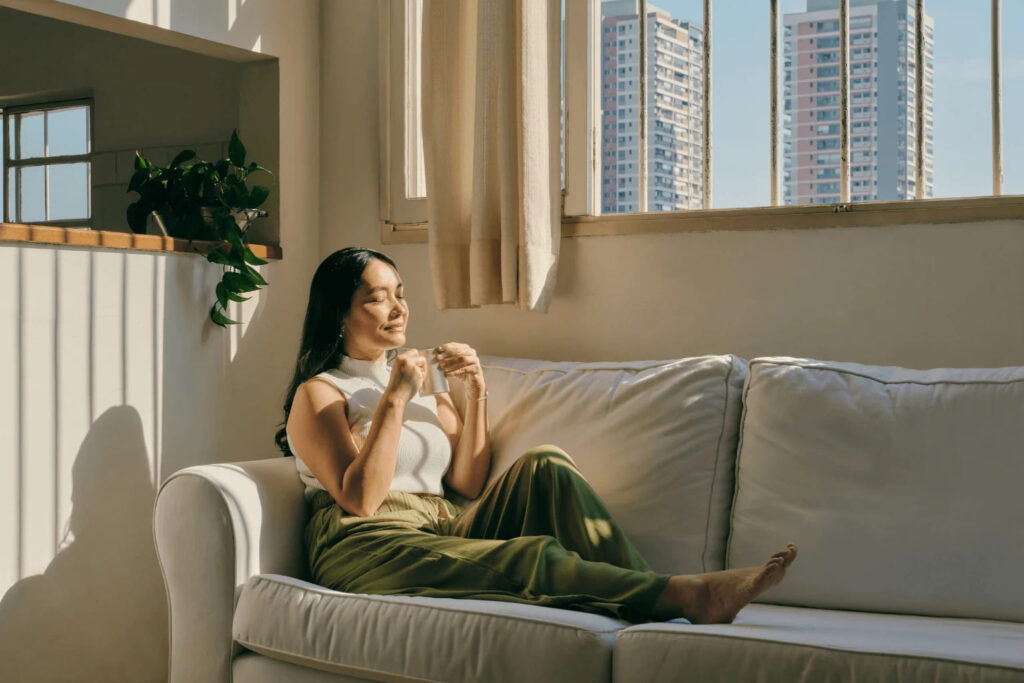 a woman relaxing in the living room