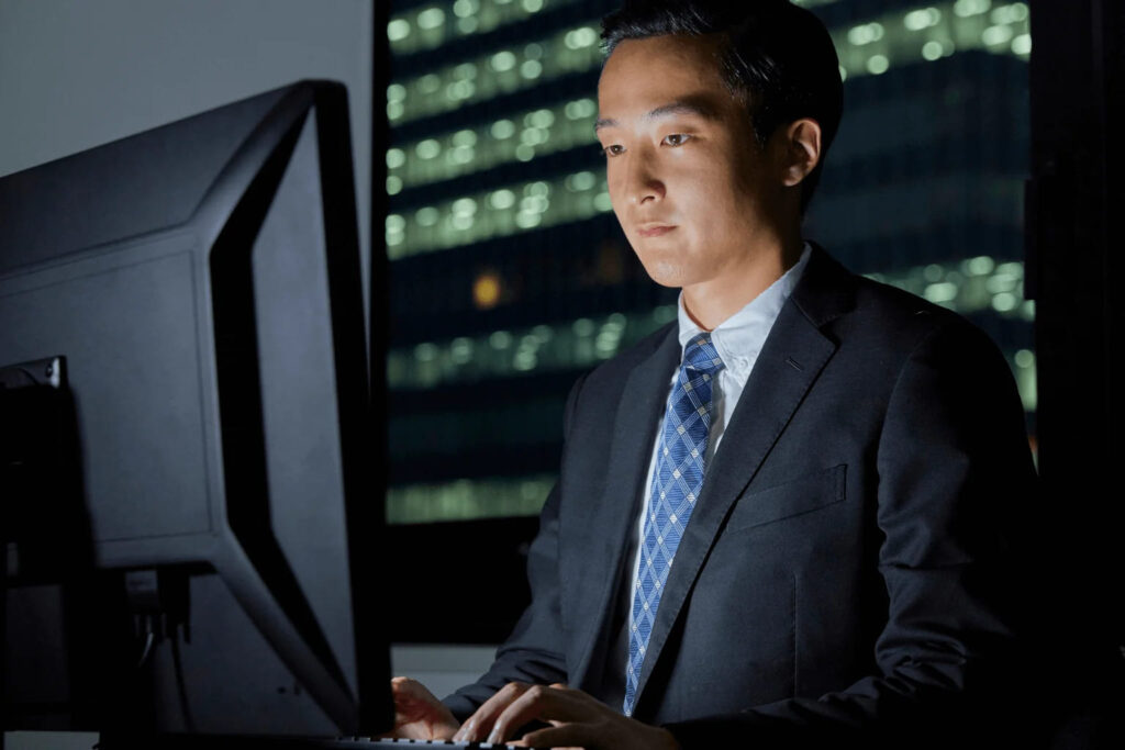 Clayton Realtor Realtor working on computer during evening hours